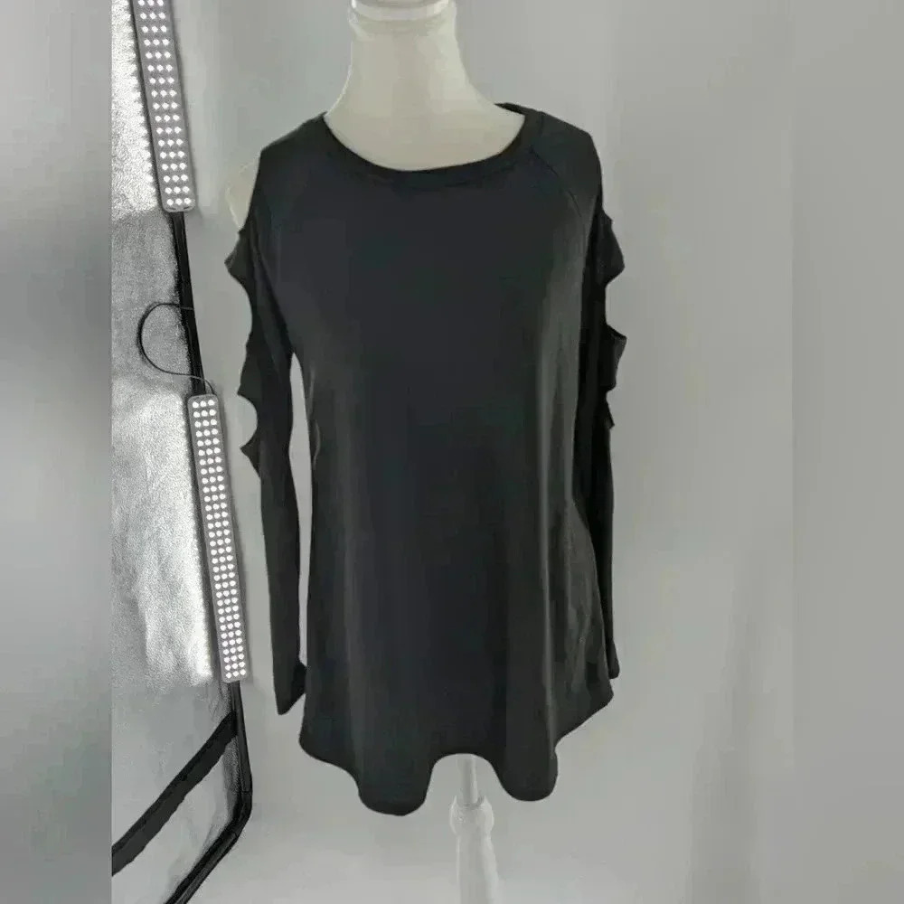 Women's Size Medium Long Sleeve Solid Black Top With Arm Slits Up Both Arms NWOT